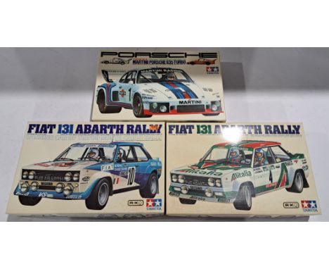 Tamiya a group of 1:20 scale model kits to include; Porsche 935 Turbo 'Martini', Fiat Abarth Rally 'Winner Of The '80 Monty C