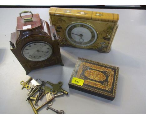 A mid 20th century Oriental mantle clock, an Edwardian inlaid mantle clock, a Sorrento style trinket box and mixed clock keys