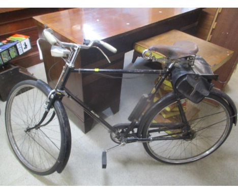 A vintage Raleigh racing bicycle with a Brooks leather seat A/F, rear satchel in black, circa 1930 