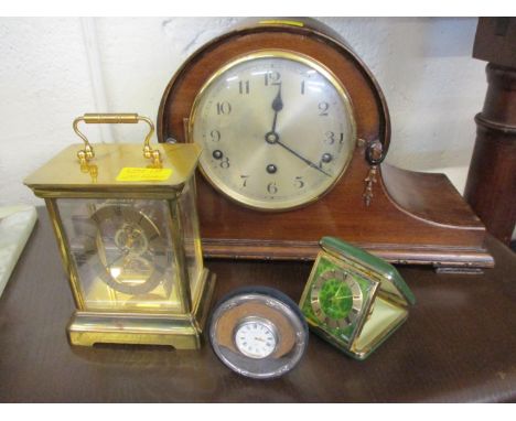 A mahogany cased mantle clock, together with a mid 20th century travel clock, a white metal dressing table clock, Witney &amp