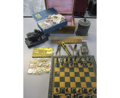 Two vintage nutcrackers, Wills Players cigarette cards, a complete chess set, a coal figural group, coins and other items of 