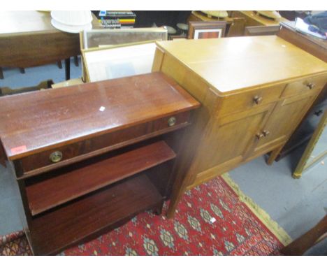 A reproduction mahogany magazine rack with drawer under, together with a light oak sideboard and a G-Plan dressing tablePosit