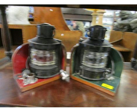 Two port and starboard boat navigate lights, mounted as bookends 