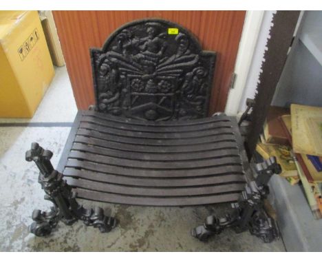 A selection of fireside items to include fire dogs, grate, fire back, fireside implements and other items 