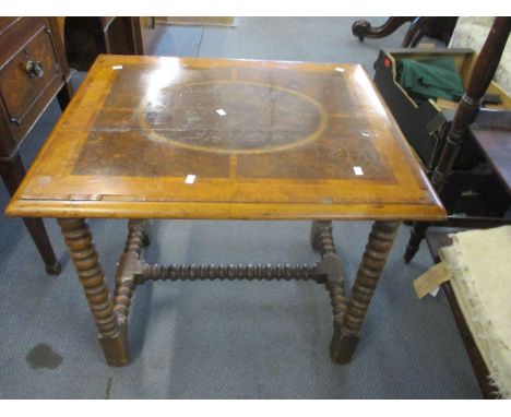 A William and Mary walnut part table having bobbin turned legs and supports 