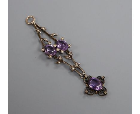 An Edwardian yellow metal, amethyst and seed pearl set drop pendant, 7.6cm.