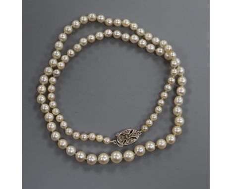 A single strand cultured pearl necklace with diamond set white metal clasp, 41cm.