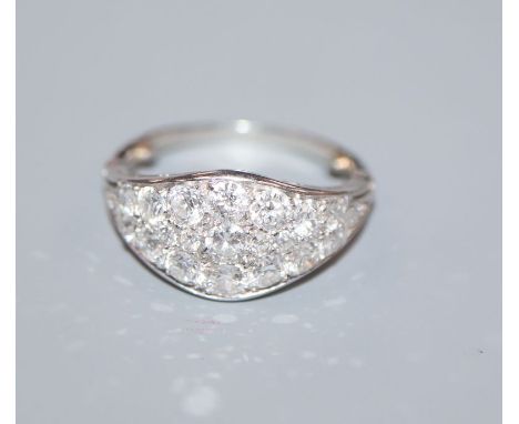 A white metal and diamond cluster set elliptical shaped ring, in an Asprey box, size H/I.