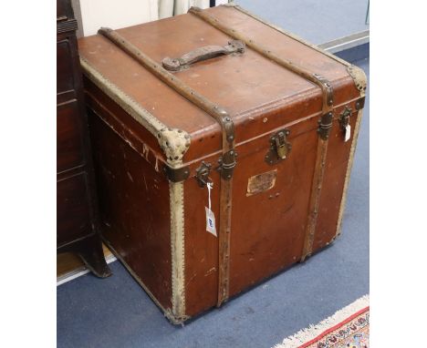 A Victorian leather covered wooden bound trunk W.60cm