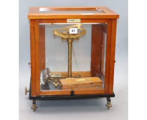 A mahogany cased beam scales and various cased weights