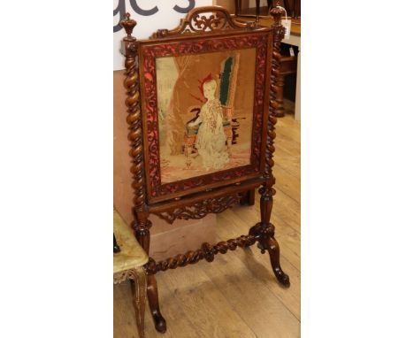 A Victorian walnut framed firescreen inset tapestry panel H.115cm