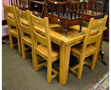 A dining room suite comprising a dining table with one leaf, five chairs and a bench (modern oak) (7)