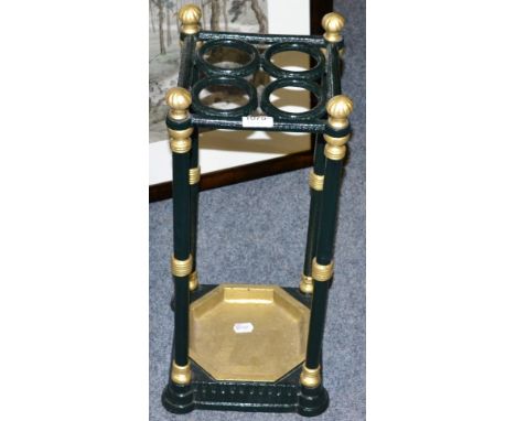 A green and gold painted cast iron square stick stand  