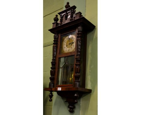 A 19th century regulator style wall clock with silvered dial and turned pillar case