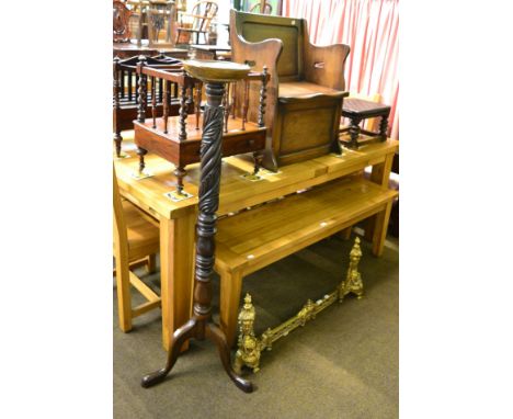 A Victorian Canterbury, a carved tripod torchere, a small bench seat with hinged seat, a foot stool and an extending brass fi