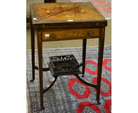 An Edwardian marquetry inlaid, rosewood envelope card table 