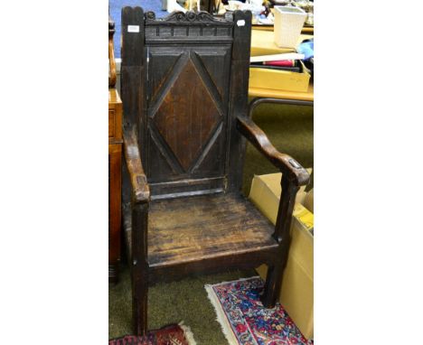 A joined oak armchair 