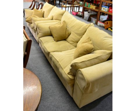 A modern cream three seater and two seater sofa 