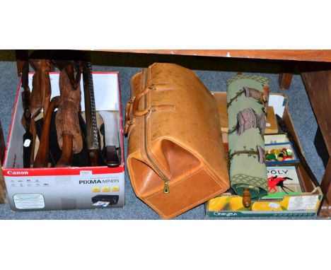 Assorted collectables to include racing games, an American leather gladstone bag, African carvings, tapestry, cased carving s