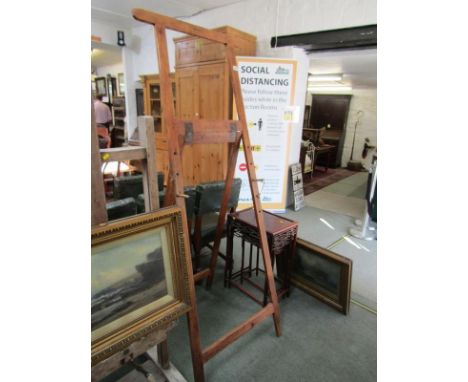 ARTIST EASEL, a vintage stained pine artist easel, 76" high 
