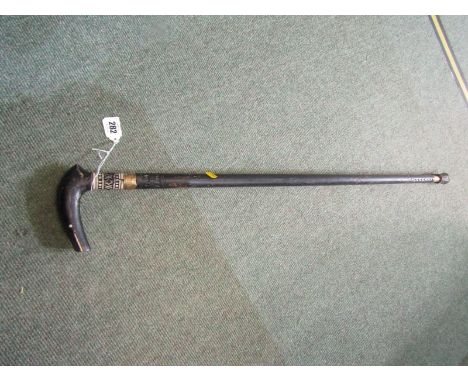 SWORD STICK, in ebonised cane 