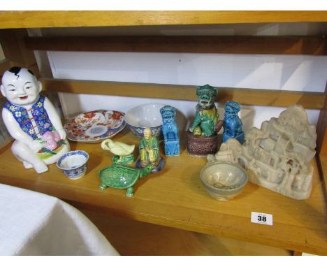 ORIENTAL CERAMICS, 3 glazed small temple dogs, Imari petal shaped dish, carved soap stone temple group and contents of shelf 