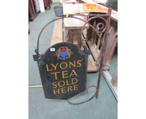 ENAMEL SIGN, "Lyons Tea  Sold Here" double sided enamel sign with emblem to top, on a wrought iron frame, 35" including frame