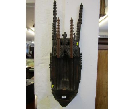 CARVING, a gothic design carved oak alcove shelf, 35" height 