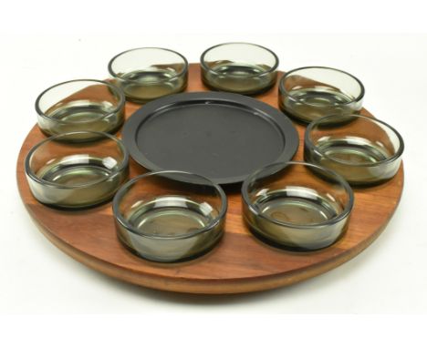 A vintage Danish inspired 20th century circa 1970s teak &amp; glass Lazy Susan serving appetizer tray in the manner of Digsme