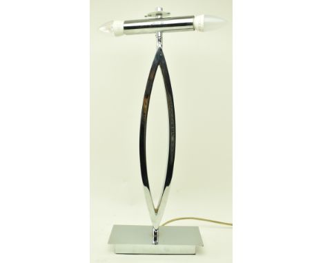 British Modern Design - A contemporary chrome metal geometric desk table lamp. The lamp having twin light mounts over a squar