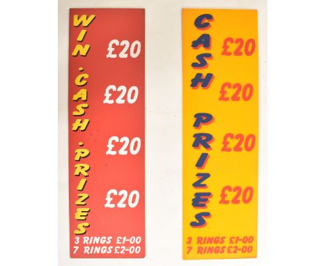 Two vintage late 20th century funfair / fairground Hoopla amusement park cash prize signs. One on yellow ground &amp; one on 