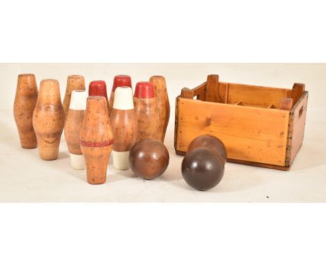 A complete set of vintage early to mid 20th century carved wood &amp; hand painted pub bowling pins / skittles, including thr