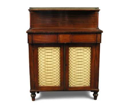 A Regency mahogany chiffonier, with raised shelf and brass gallery, above a blind frieze drawer and satin backed brass grill 