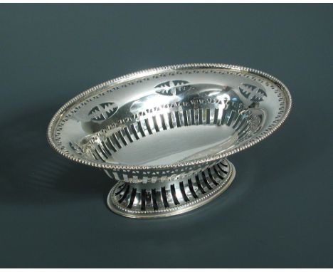 A George V silver basket for Boodle & Dunthorne, by Richard Comyns, London 1932, of oval shape the body pierced within a bead