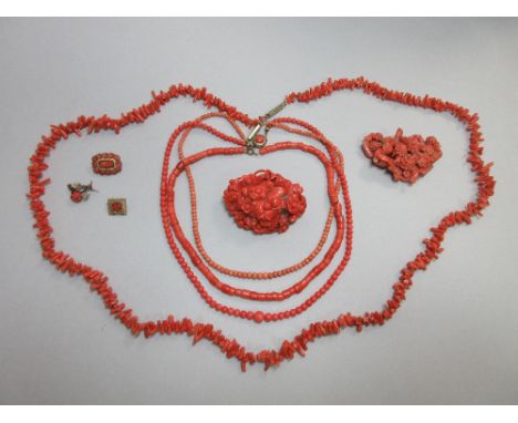 A collection of antique and other red coral jewellery, to include two large antique brooches composed of carved coral flowers