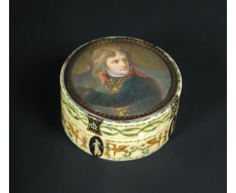 A Napoleonic painted ivory circular snuff box, the lift off lid with a portrait of Napoleon on the Bridge at Arcole in 1796 a