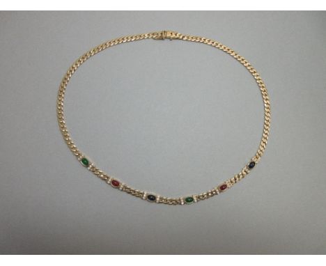 A ruby, emerald, sapphire and diamond set neck chain, the flattened curb link chain of yellow metal stamped '750' to indicate