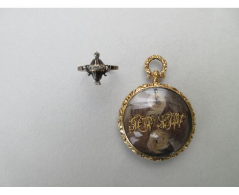 A 1776 diamond and enamel mourning ring and a hairwork memorial pendant, the first designed as a black enamel urn set with ol