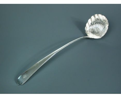 A George III Irish silver soup ladle, maker indistinct, Dublin 1776, of plain form, engraved with the crest of Birkbeck, with