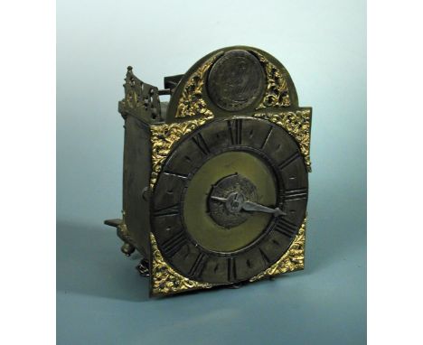 A miniature posted frame lantern type wall clock, 18th century, the 10cm brass dial bearing a circular silvered plaque to the