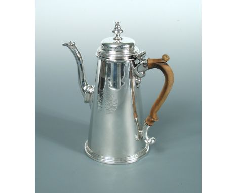A George II silver coffee pot, by Edward Vincent, London 1729, of plain slightly tapering form, with stepped base, crested an