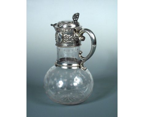 A Victorian silver mounted glass claret jug, by W&G Sissons Sheffield 1870, flask shaped, the glass decorated with etched sta