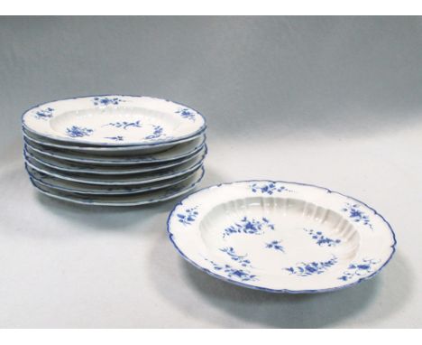 A set of eight Caughley blue and white shaped circular dished plates, decorated with scattered Chantilly sprigs, 'C' marks in