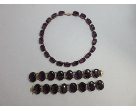 A late 19th century purple paste rivière necklace together with a similar choker which converts into a pair of bracelets, the