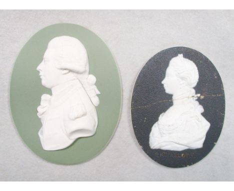 A Wedgwood green jasperware portrait medallion of King George IV, modelled by John Flaxman, incised 'WEDGWOOD' and incorrectl