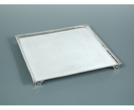 A continental square salver, possibly Dutch, marks possibly Amsterdam, first standard (925) silver, 1859, maker RP, of square