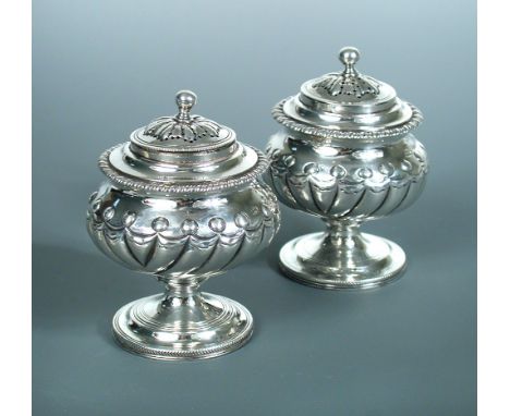 Two George IV spice casters, the first by Richard Pearce, London 1824, the second by Richard Pearce and George Burrows, Londo