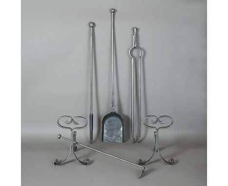 A rare suite of 17th century steel fire tools and rests, with varying finials and a pair of rests, the shovel stamped with ma
