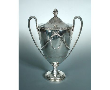 A George III silver two handled urn, by John Wakelin and Wm Taylor, London 1779, with quarter fluted body, the upper section 