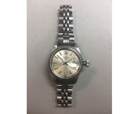 Rolex - a lady's stainless steel Oyster Perpetual Date wristwatch, the silver coloured dial with baton markers, sweep second 